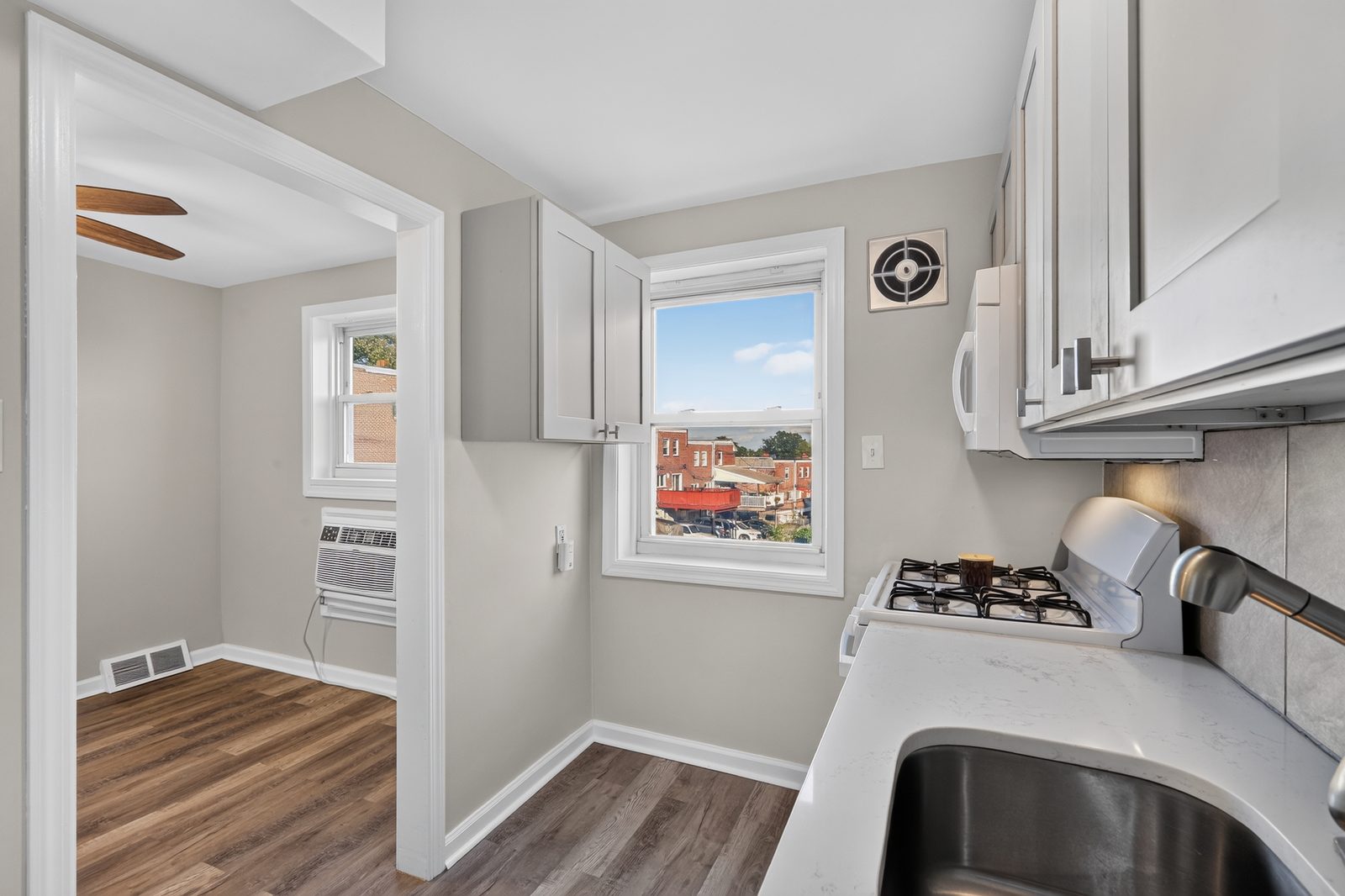 Kitchen flowing to dining